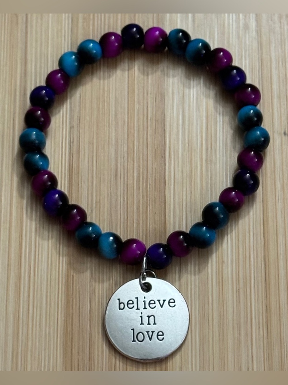 Hand Crafted Multicolor Beaded Stretch Bracelet Believe in Love Charm